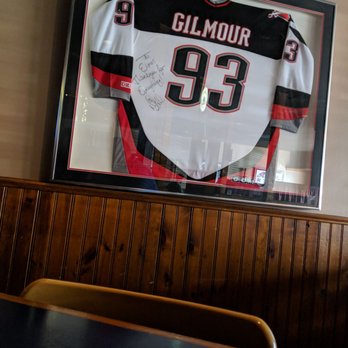 Elmo's - Lots of signed Sabres jerseys on the walls - American Near Me - Getzville, New York Elmo's - Lots of signed Sabres jerseys on the walls - American Near Me - Getzville, New York