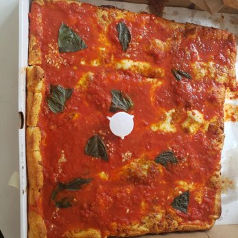 Phil & Sons Pizzeria & Restaurant - Grandma pizza. Crispy crust, raw garlic on top, basil, sauce, cheese. Delicious. Best in the neighborhood. - Pizza Near Me - Flushing, New York Phil & Sons Pizzeria & Restaurant - Grandma pizza. Crispy crust, raw garlic on top, basil, sauce, cheese. Delicious. Best in the neighborhood. - Pizza Near Me - Flushing, New York
