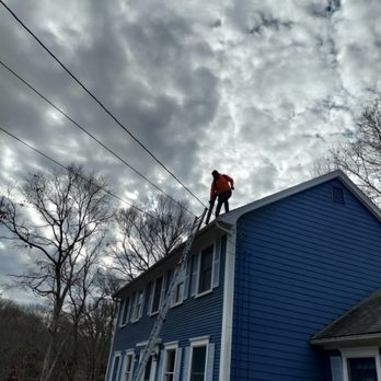 Optimus Tree Service and Landscaping - a man on the roof of a house - Tree Services Near Me - North Providence, Rhode Island Optimus Tree Service and Landscaping - a man on the roof of a house - Tree Services Near Me - North Providence, Rhode Island
