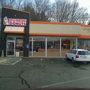 Dunkin' - a car parked in front of a dunkin donuts store - Donuts Near Me - Bedford, Massachusetts Dunkin' - a car parked in front of a dunkin donuts store - Donuts Near Me - Bedford, Massachusetts