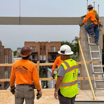 ENC Construction and Development - two workers on a construction site - General Contractors Near Me - Chicago, Illinois ENC Construction and Development - two workers on a construction site - General Contractors Near Me - Chicago, Illinois