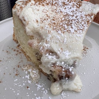 Wilma & Frieda's Cafe - Cinnamon bun drenched in cream cheese frosting - Comfort Food Near Me - Palm Desert, California Wilma & Frieda's Cafe - Cinnamon bun drenched in cream cheese frosting - Comfort Food Near Me - Palm Desert, California