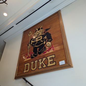 Duke University Golf Club - Inside the Washington Duke Inn & Golf Club. Large old-school Duke sign outside the golf shop. - Golf Near Me - Durham, North Carolina Duke University Golf Club - Inside the Washington Duke Inn & Golf Club. Large old-school Duke sign outside the golf shop. - Golf Near Me - Durham, North Carolina