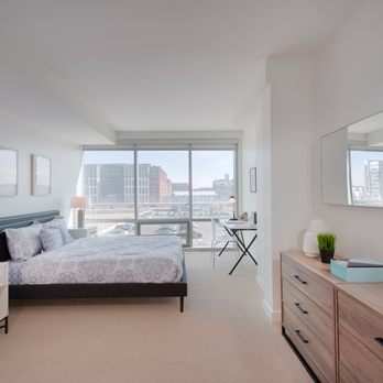 F1RST Residences - You'll find spacious bedrooms with ample storage at F1RST Residences - Apartments Near Me - Washington, DC, District of Columbia