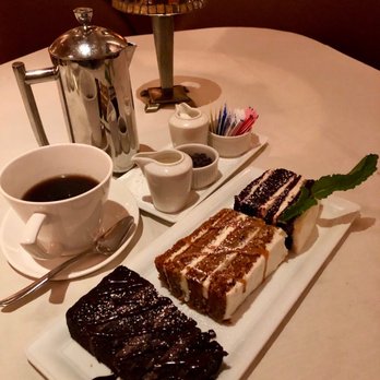 Eddie Merlot's - Trio of Holiday Cakes and a Warm Embrace. Coffee... I mean Coffee... - Steakhouses Near Me - Indianapolis, Indiana Eddie Merlot's - Trio of Holiday Cakes and a Warm Embrace. Coffee... I mean Coffee... - Steakhouses Near Me - Indianapolis, Indiana
