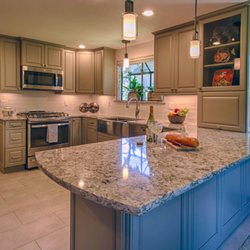 Ctm Remodel & Design Center - Quartz countertops, Greige painted frameless cabinetry and heated tile floor totally updated this kitchen!