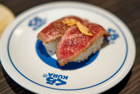 Kura Revolving Sushi Bar by null