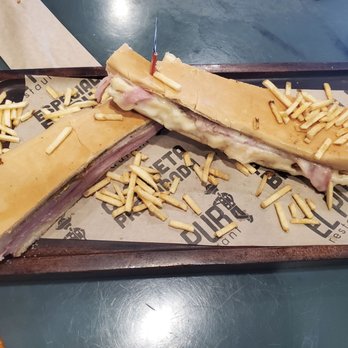 El Pub - Half a Cuban sandwich for the price of a full sandwich - Cuban Near Me - Miami, Florida