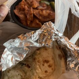 Veg schezwan momos (dumpling)- big enough single serving for lunch! and garlic naan Veg schezwan momos (dumpling)- big enough single serving for lunch! and garlic naan