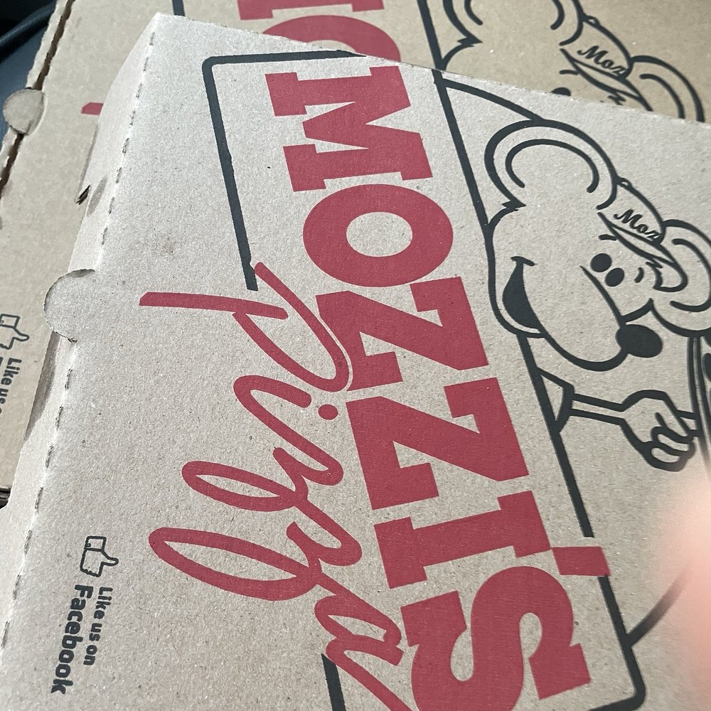 Mozzi's Pizza - Boxes holding the hot food - Pizza Near Me - New Palestine, Indiana Mozzi's Pizza - Boxes holding the hot food - Pizza Near Me - New Palestine, Indiana