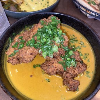 Stage Kitchen & Bar - "OUR" FRIED CHICKEN malvani coconut curry, lime - Tapas/Small Plates Near Me - Palm Beach Gardens, Florida Stage Kitchen & Bar - "OUR" FRIED CHICKEN malvani coconut curry, lime - Tapas/Small Plates Near Me - Palm Beach Gardens, Florida