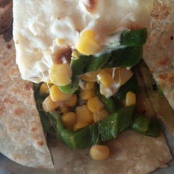 The Quesadillas - The inside of my rajas con crema quesadilla. FRESH Green chiles, corn, crema, YUM. - Mexican Near Me - Tucson, Arizona