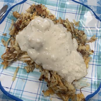 Come-N-Get It - Kitchen Sink.  Biscuit, hash browns, sausage, bacon, eggs and gravy. - American Near Me - Marietta, Georgia