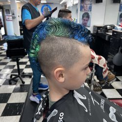 Frank & Vinny's Barber Shop - My son with his colored Mohawk!