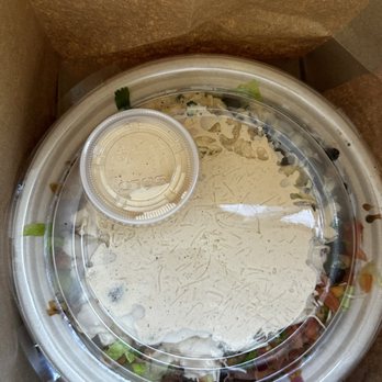 Currito - the inside of a takeout container - Mexican Near Me - Philadelphia, Pennsylvania
