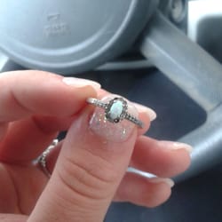Kay Jewelers - Two diamonds fell out.  They  refuse to fix it and it's less than a month old