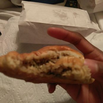 Friendly Donuts - Boudin Kolache bitten to show inside lol - Donuts Near Me - Houston, Texas