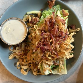 The Greenhouse - Greenhouse Wedge Bacon, blistered tomatoes, radish, cucumber, onion straws, ice berg lettuce & I got their Ranch Dressing - Gastropubs Near Me - Newark, Delaware The Greenhouse - Greenhouse Wedge Bacon, blistered tomatoes, radish, cucumber, onion straws, ice berg lettuce & I got their Ranch Dressing - Gastropubs Near Me - Newark, Delaware
