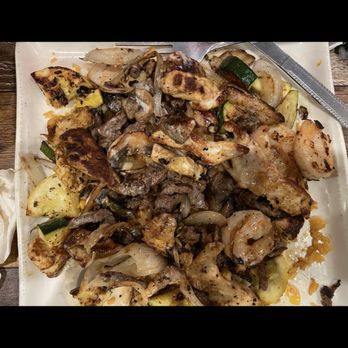 La Catrina - I forgot what this was called but it had rice, chicken, steak, shrimp and peppers with cheese on top. - Mexican Near Me - Ellijay, Georgia