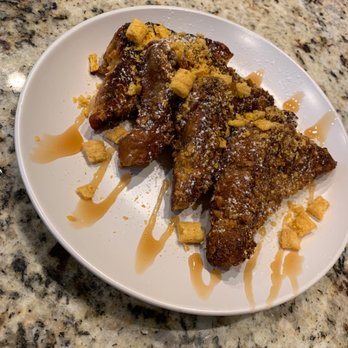 Seasoned by Spiffy Catering - Cap'n Crunch crusted French toast with a caramel drizzle. - Caterers Near Me Seasoned by Spiffy Catering - Cap'n Crunch crusted French toast with a caramel drizzle. - Caterers Near Me