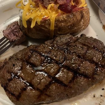 Texas Roadhouse - 11oz hand cut sirloin...medium rare...could have cut it with a fork. Loaded baked potato side. - Steakhouses Near Me - Menifee, California