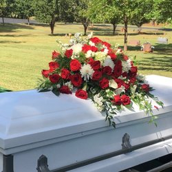 Flowers By Janae - Casket spray with red roses.