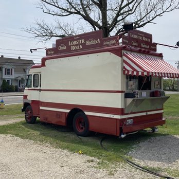 The Ocean Roll - Cute food truck.  They have outdoor seating with several picnic tables under a tent. - Seafood Near Me - Kennebunk, Maine