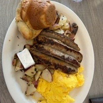 Millie's Cafe - Pasadena - Two egg breakfast with scrambled eggs, chicken apple sausage, potatoes and a muffin shaped buscuit - Breakfast & Brunch Near Me - Pasadena, California Millie's Cafe - Pasadena - Two egg breakfast with scrambled eggs, chicken apple sausage, potatoes and a muffin shaped buscuit - Breakfast & Brunch Near Me - Pasadena, California