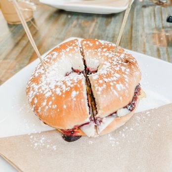 Along the Way Cafe - Muccy Cristo - bagel with blueberry jam, turkey, Swiss cheese, and egg. You can choose between plain or everything bagel - Coffee & Tea Near Me - Winnemucca, Nevada Along the Way Cafe - Muccy Cristo - bagel with blueberry jam, turkey, Swiss cheese, and egg. You can choose between plain or everything bagel - Coffee & Tea Near Me - Winnemucca, Nevada