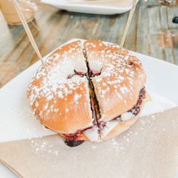 Along the Way Cafe - Muccy Cristo - bagel with blueberry jam, turkey, Swiss cheese, and egg. You can choose between plain or everything bagel