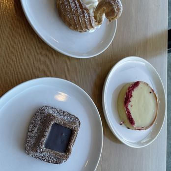 Left Bank Pastry - Swan, raspberry passion fruit tart, flourless chocolate baked - Bakeries Near Me - Olympia, Washington Left Bank Pastry - Swan, raspberry passion fruit tart, flourless chocolate baked - Bakeries Near Me - Olympia, Washington