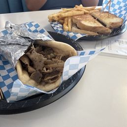 Gyro and patty melt with fries Gyro and patty melt with fries