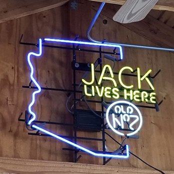 Four Deuces Saloon - A sign on the patio - Bars Near Me - Tombstone, Arizona