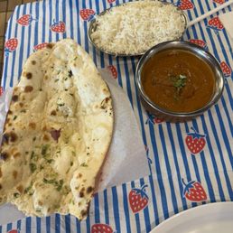 Garlic Naan, Jasmine rice, and lamb korma Garlic Naan, Jasmine rice, and lamb korma