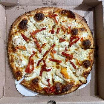 Capotorto's Apizza Center - "Route 80 Commuter" (classic white pie buttered with ricotta cheese & topped with grilled chicken, sun dried tomatoes, fresh garlic) - Pizza Near Me - East Haven, Connecticut Capotorto's Apizza Center - "Route 80 Commuter" (classic white pie buttered with ricotta cheese & topped with grilled chicken, sun dried tomatoes, fresh garlic) - Pizza Near Me - East Haven, Connecticut