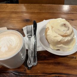 Chai latte and cinnamon roll Chai latte and cinnamon roll