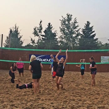 Campus Pub - a group of people playing volleyball - Sports Bars Near Me - Wausau, Wisconsin Campus Pub - a group of people playing volleyball - Sports Bars Near Me - Wausau, Wisconsin