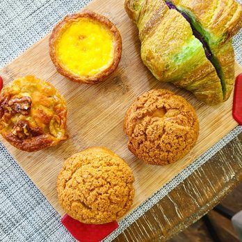 CA Bakehouse - Pastry Spread: Banana Mochi Cake, Black Sesame Choux, Portuguese Egg Tart, Ube Croissant and Durian Choux - Bakeries Near Me - San Jose, California CA Bakehouse - Pastry Spread: Banana Mochi Cake, Black Sesame Choux, Portuguese Egg Tart, Ube Croissant and Durian Choux - Bakeries Near Me - San Jose, California