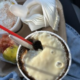 Root beer raspa with lechera (condensed milk on top) Root beer raspa with lechera (condensed milk on top)