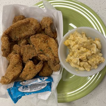 Cajun On the Go - Fried catfish plate with a side of spicy Mac and cheese. - Food Trucks Near Me Cajun On the Go - Fried catfish plate with a side of spicy Mac and cheese. - Food Trucks Near Me