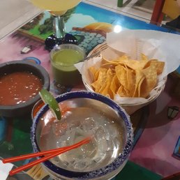 Chips and salsa and extra spicy salsa  and 2 for 1 house margaritas