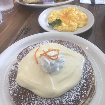Moke’s Bread And Breakfast - Lilikoi pancakes with a side of eggs and stuffed hash browns with toast - Breakfast & Brunch Near Me - Honolulu, Hawaii Moke’s Bread And Breakfast - Lilikoi pancakes with a side of eggs and stuffed hash browns with toast - Breakfast & Brunch Near Me - Honolulu, Hawaii