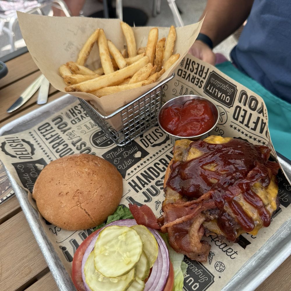 Neptunes Taphouse and Eatery - Bonfire at sunset w/ GF bun - American Near Me - Livingston, Montana Neptunes Taphouse and Eatery - Bonfire at sunset w/ GF bun - American Near Me - Livingston, Montana