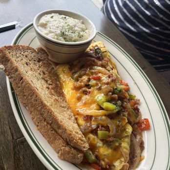 Taste Kitchen Bar - Texas omelette with grits and toast - Breakfast & Brunch Near Me - Houston, Texas Taste Kitchen Bar - Texas omelette with grits and toast - Breakfast & Brunch Near Me - Houston, Texas