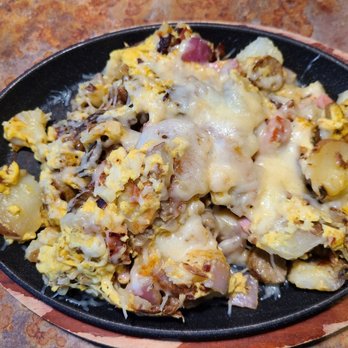 Huckleberry's - The Mississippi- all the meats, egg. Onion, potato, mushroom & cheese. Delicious! It also came with a Huckleberry muffin. - Breakfast & Brunch Near Me - Roseville, California Huckleberry's - The Mississippi- all the meats, egg. Onion, potato, mushroom & cheese. Delicious! It also came with a Huckleberry muffin. - Breakfast & Brunch Near Me - Roseville, California