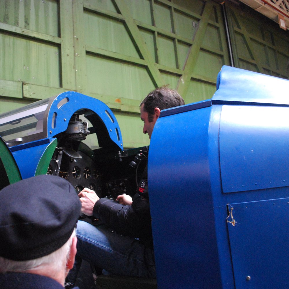 Boscombe Down Aviation Collection - Trying to fly in the Link simulator - Museums Near Me - Old Sarum, WIL