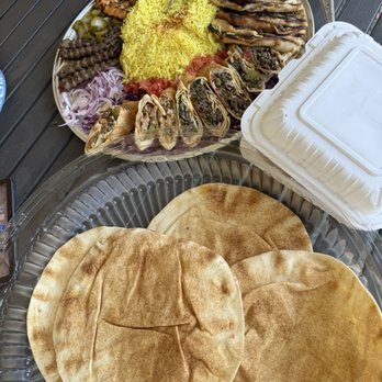 Sultans Mediterranean Grill - Family meal platter with pita and garlic potatoes in container - Mediterranean Near Me - Bakersfield, California Sultans Mediterranean Grill - Family meal platter with pita and garlic potatoes in container - Mediterranean Near Me - Bakersfield, California