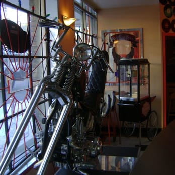Kane's Harley Diner - a motorcycle parked in front of a window - Diners Near Me - Calgary, Alberta Kane's Harley Diner - a motorcycle parked in front of a window - Diners Near Me - Calgary, Alberta