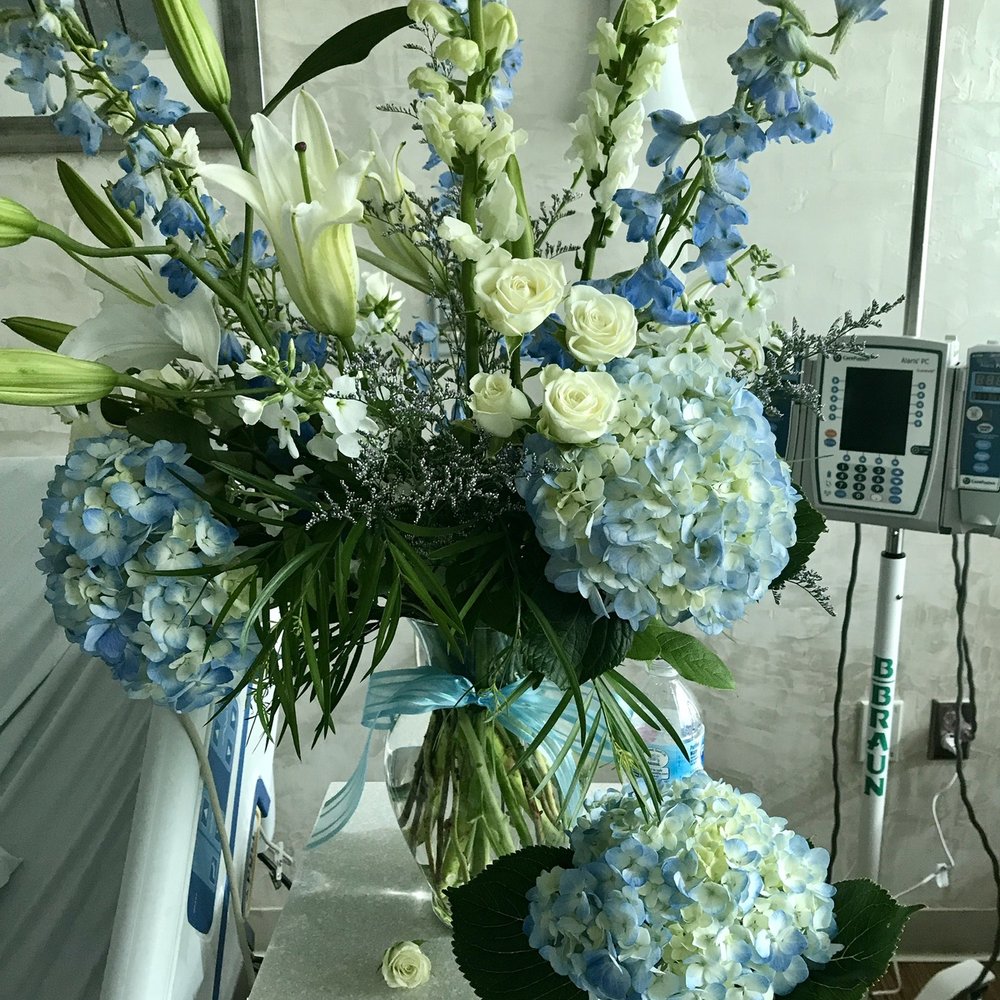 Floral Impressions - Unfortunately the nurse who brought them in from the hospital broke off 2 full stems of hydrangeas - Florists Near Me - Tampa, Florida