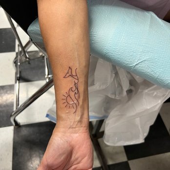 Vertigo Tattoo & Body Piercing - Tattoo Near Me - Manns Harbor, North Carolina